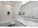 Elegant bathroom with a marble countertop, sleek black framed mirror, and shower-tub combo at 5022 Ohm Ln, Charlotte, NC 28270