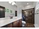 Bathroom with vanity, shower, and tiled floor at 5523 Closeburn Rd, Charlotte, NC 28210