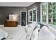 Relaxing bedroom with comfortable seating area and private access to backyard at 5523 Closeburn Rd, Charlotte, NC 28210