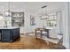 Kitchen dining area with hardwood floors, stylish table, and chairs at 5523 Closeburn Rd, Charlotte, NC 28210