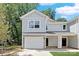 Modern duplex with gray siding and stone accents at 734 Cantwell St, Charlotte, NC 28208