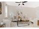 Living room featuring neutral colors, a plush sofa, and a coffee table at 734 Cantwell St, Charlotte, NC 28208