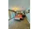 Cozy bedroom with a chandelier and doors leading to the outdoors at 152 Bridge Pointe Ln, Hickory, NC 28601