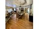 Bright dining room featuring hardwood floors, modern lighting, and an open floor plan for easy entertaining at 152 Bridge Pointe Ln, Hickory, NC 28601