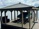 The covered dock features a boat lift for easy lake access and protection from the elements at 152 Bridge Pointe Ln, Hickory, NC 28601