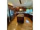 Well-appointed kitchen featuring an island, custom cabinets, and stainless steel appliances at 152 Bridge Pointe Ln, Hickory, NC 28601