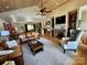Spacious living room boasts a wood-paneled ceiling, fireplace, and comfortable seating for relaxation and entertainment at 152 Bridge Pointe Ln, Hickory, NC 28601