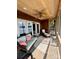 Enclosed sunroom with outdoor furniture and a beautiful lake view, perfect for relaxation at 152 Bridge Pointe Ln, Hickory, NC 28601