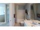 Clean bathroom with tub shower, vanity, and tile flooring at 133 Woodhall Way, Troutman, NC 28166