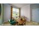 Well-lit office featuring a wood desk, comfortable seating, and a calming view at 133 Sari St, Troutman, NC 28166