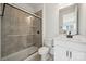 Bathroom features a shower, toilet, and sink with white cabinets at 2140 Indigo Branch Rd, Indian Land, SC 29707