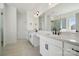 Large bathroom featuring double sinks, white cabinets and a glass shower at 2140 Indigo Branch Rd, Indian Land, SC 29707