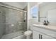 Bathroom with a glass-enclosed shower, black fixtures, and plenty of natural light at 2140 Indigo Branch Rd, Indian Land, SC 29707