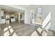 Open floor plan featuring hardwood floors, lots of natural light, and an open flow to the kitchen at 2140 Indigo Branch Rd, Indian Land, SC 29707