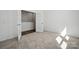 Bright bedroom with an open door featuring soft carpet and neutral walls providing warmth at 3112 Beacon Heights Rd, Indian Land, SC 29707