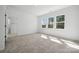 Bright bedroom with soft carpet and multiple windows offers ample natural light at 3112 Beacon Heights Rd, Indian Land, SC 29707