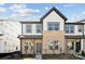 Charming new construction townhouse with brick and siding exterior and manicured landscaping at 3112 Beacon Heights Rd, Indian Land, SC 29707