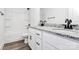 Bathroom featuring double sinks, granite countertop, and a bathtub and shower combo at 4206 Old Monroe Marshville Rd, Wingate, NC 28174