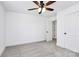 Bright bedroom features a ceiling fan and a connecting door at 4206 Old Monroe Marshville Rd, Wingate, NC 28174