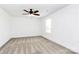 Bright bedroom features a ceiling fan, neutral carpet, and natural light from the window at 4206 Old Monroe Marshville Rd, Wingate, NC 28174