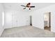 Spacious bedroom with neutral carpeting and a ceiling fan at 4206 Old Monroe Marshville Rd, Wingate, NC 28174