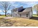 Gray two-story home with concrete patio and lush green lawn at 4206 Old Monroe Marshville Rd, Wingate, NC 28174