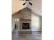 Cozy living room showcasing a stone fireplace and neutral paint at 59 Browning Dr, Taylorsville, NC 28681