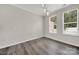 Bright dining room with hardwood floors and large windows at 769 River Park Rd, Belmont, NC 28012