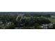 An aerial view captures a neighborhood with lush greenery, showcasing a peaceful and well-treed residential area at 113 Fairview St, Clover, SC 29710