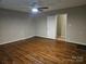 Large bedroom with hardwood floors and natural light; a blank canvas awaiting your personal touch at 113 Fairview St, Clover, SC 29710