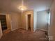 Bedroom features neutral walls, carpet, and a closet at 113 Fairview St, Clover, SC 29710