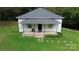 Charming single-story home with a welcoming front porch and well-maintained lawn surrounded by mature trees at 113 Fairview St, Clover, SC 29710