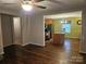 Open-concept living area flows into a traditional kitchen with ample counter space and natural light at 113 Fairview St, Clover, SC 29710