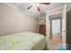 Comfortable bedroom with dresser and an entrance to an en-suite bathroom at 102 Sleaford Ct, Dallas, NC 28034