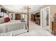 Large Primary bedroom with four poster bed, with an attached bath and walk-in closet at 102 Sleaford Ct, Dallas, NC 28034