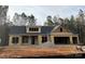 New construction home featuring a dark roof and wood framing at 1025 Baylor Grv, Monroe, NC 28112