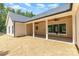 The backyard features a covered patio, ideal for enjoying the outdoors at 1025 Baylor Grv, Monroe, NC 28112
