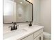 Bathroom with double vanity, black fixtures and hardware, and a large mirror at 1025 Baylor Grv, Monroe, NC 28112