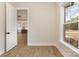 Cozy room with open door leading to the kitchen and backyard views at 1025 Baylor Grv, Monroe, NC 28112