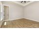 Neutral toned bedroom with tray ceiling and fan, recessed lighting, and natural light at 1025 Baylor Grv, Monroe, NC 28112