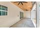 Covered patio with ceiling fan and recessed lighting perfect for outdoor entertaining at 1025 Baylor Grv, Monroe, NC 28112