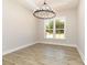 Spacious dining room featuring a modern chandelier and natural light at 1025 Baylor Grv, Monroe, NC 28112