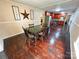 Bright dining room features hardwood floors and built-in shelving at 212 Pethel St, Kannapolis, NC 28081
