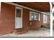 Brick home with covered patio and additional storage at 212 Pethel St, Kannapolis, NC 28081