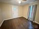 Bright living room featuring hardwood floors and neutral walls at 212 Pethel St, Kannapolis, NC 28081