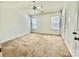 Bright bedroom features carpet, neutral walls, and two windows providing natural light at 4327 Kobuk Ln, Charlotte, NC 28269