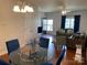 Inviting living room featuring a dining area, comfortable seating, and ample natural light at 4327 Kobuk Ln, Charlotte, NC 28269