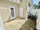 Private outdoor patio area with access to a door at 4327 Kobuk Ln, Charlotte, NC 28269
