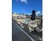 Community pool with ample lounge seating and umbrella at 4327 Kobuk Ln, Charlotte, NC 28269