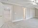 Bedroom featuring two doorways, neutral walls, carpet, and a closet at 5916 Bridger Ct, Charlotte, NC 28211